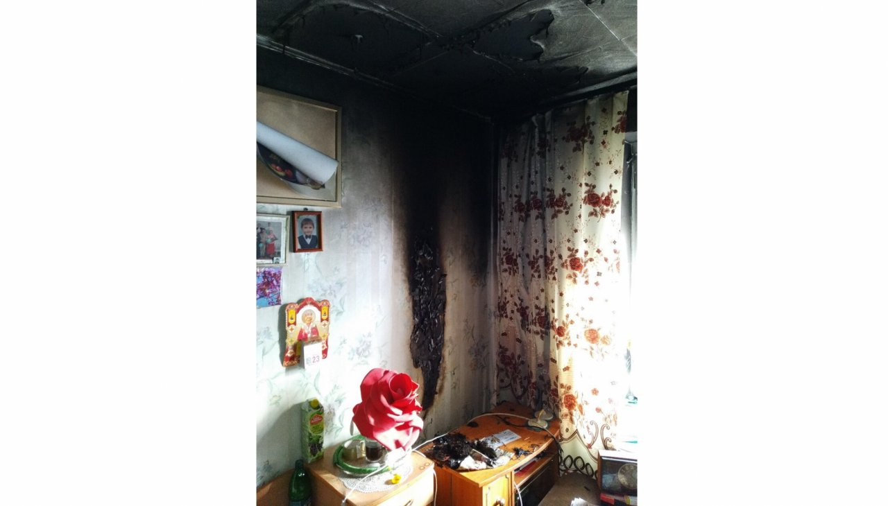 Свечка у фотографии стала причиной пожара в квартире на 60 лет Октября