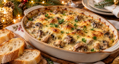 Шампиньоны в нежной сырной заливке: горячая закуска, ради которой стоит оставить место на новогоднем столе